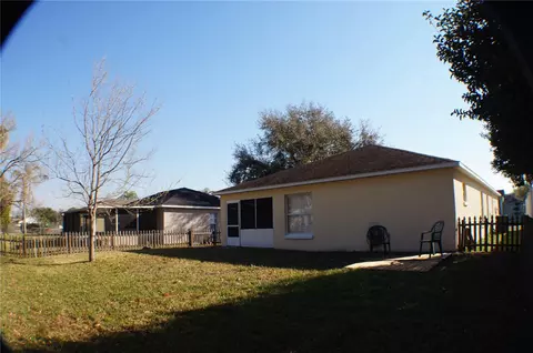 Exterior - 214 Eagle Point Loop, Auburndale, FL 33823 photo 5 of 12