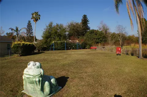 Exterior - 214 Eagle Point Loop, Auburndale, FL 33823 photo 6 of 12