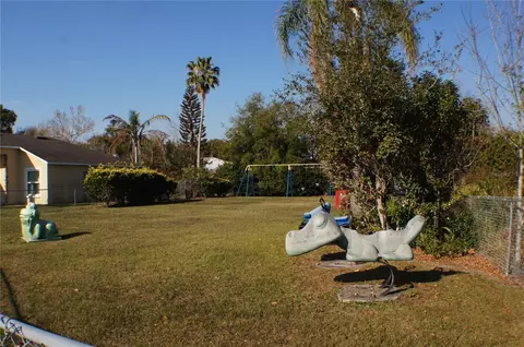 Exterior - 214 Eagle Point Loop, Auburndale, FL 33823 photo 7 of 12