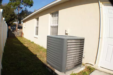 Exterior - 214 Eagle Point Loop, Auburndale, FL 33823 photo 2 of 12