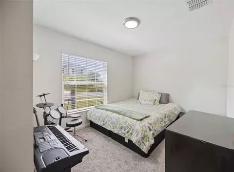Bedroom - 3960 Guernsey Bnd, Saint Cloud, FL 34772 photo 7 of 8