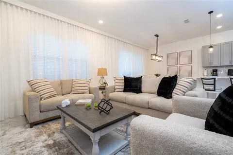 Living - 5860 High Seas Dr, Orlando, FL 32821 photo 2 of 6