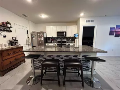 Kitchen - 2612 Harmonia Hammock Rd, Harmony, FL 34773 photo 2 of 3