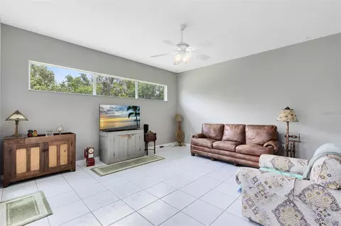 Living - 5204 Hammock Pointe Ct, Saint Cloud, FL 34771 photo 4 of 4