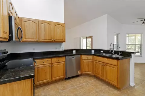 Kitchen - 2410 Bar Lou Ct, Saint Cloud, FL 34771 photo 3 of 4