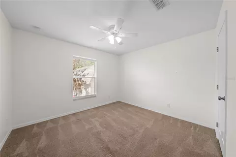 Bedroom - 3634 Doe Run Dr, Saint Cloud, FL 34772 photo 6 of 7