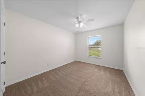 Bedroom - 3634 Doe Run Dr, Saint Cloud, FL 34772 photo 7 of 7