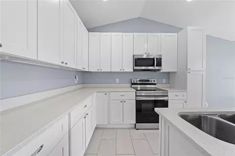 Kitchen - 3634 Doe Run Dr, Saint Cloud, FL 34772 photo 3 of 4