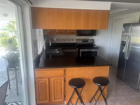 Kitchen - 8302 Split Rail Ln, Hudson, FL 34667 photo 2 of 3