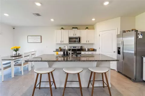 Kitchen - 2780 Swooping Sparrow Dr, Saint Cloud, FL 34773 photo 2 of 7