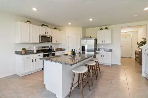 Kitchen - 2780 Swooping Sparrow Dr, Saint Cloud, FL 34773 photo 3 of 7