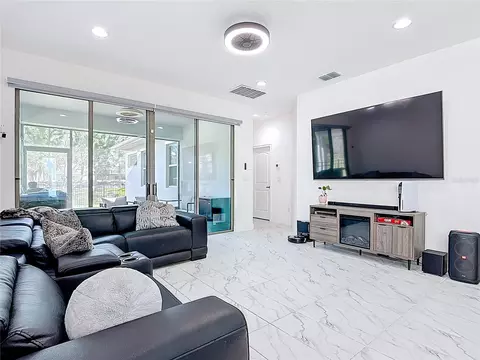 Living - 7541 Wing Span Way, Harmony, FL 34773 photo 1 of 2