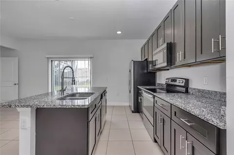 Kitchen - 3650 SW 128th Pl, Ocala, FL 34473 photo 6 of 7
