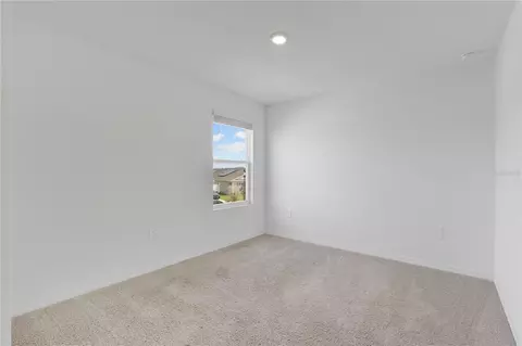 Bedroom - 557 Pink Ibis Bnd, Saint Cloud, FL 34772 photo 3 of 5