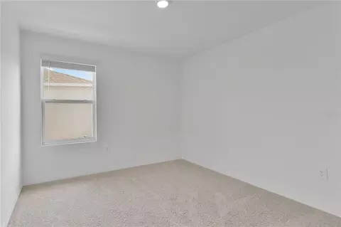 Bedroom - 557 Pink Ibis Bnd, Saint Cloud, FL 34772 photo 4 of 5