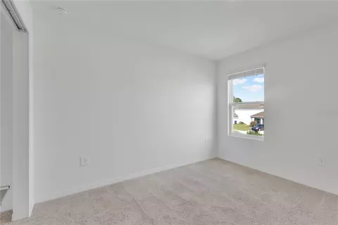 Bedroom - 557 Pink Ibis Bnd, Saint Cloud, FL 34772 photo 5 of 5
