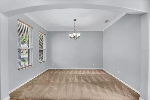 Living - 3402 Mccormick Woods Dr, Ocoee, FL 34761 photo 2 of 11