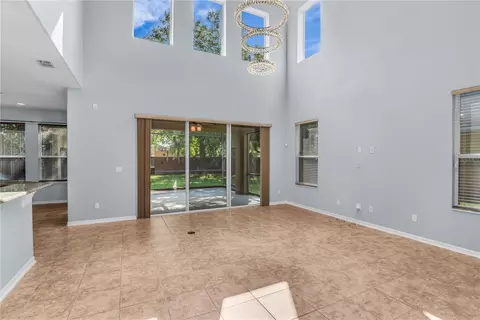 Living - 3402 Mccormick Woods Dr, Ocoee, FL 34761 photo 6 of 11