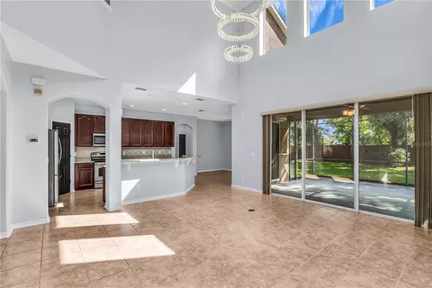 Living - 3402 Mccormick Woods Dr, Ocoee, FL 34761 photo 8 of 11