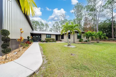 Exterior - 875 Eden Dr, Saint Cloud, FL 34771 photo 3 of 10