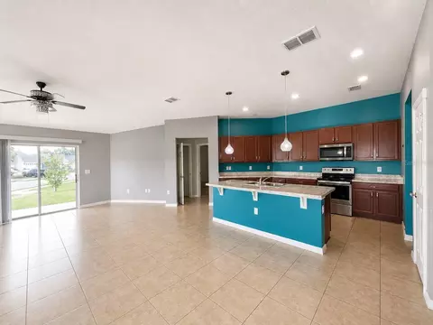 Living - 4751 S Maplewild Ln, Saint Cloud, FL 34772 photo 4 of 5