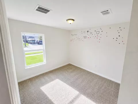 Bedroom - 4751 S Maplewild Ln, Saint Cloud, FL 34772 photo 4 of 6