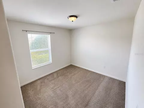 Bedroom - 4751 S Maplewild Ln, Saint Cloud, FL 34772 photo 6 of 6