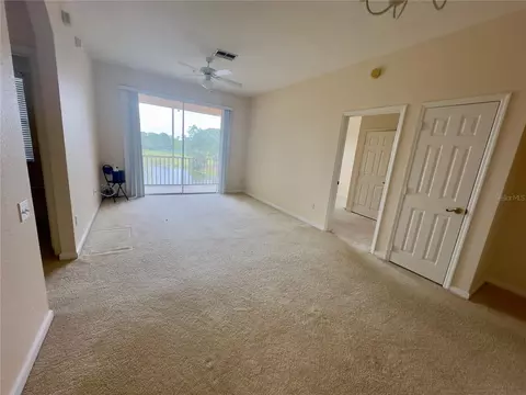Living - 13536 Turtle Marsh Loop #532, Orlando, FL 32837 photo 1 of 3