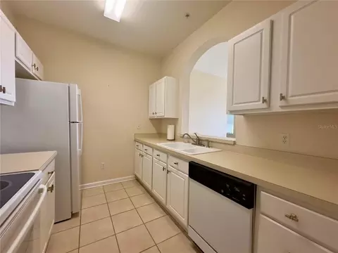 Kitchen - 13536 Turtle Marsh Loop #532, Orlando, FL 32837 photo 5 of 6