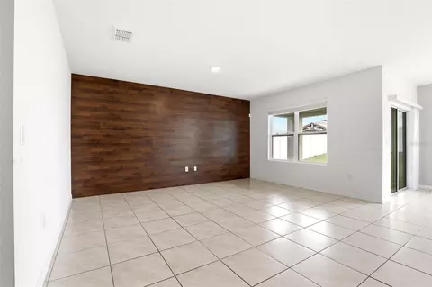 Living - 5636 Westerly Breeze Pl, Saint Cloud, FL 34771 photo 2 of 7