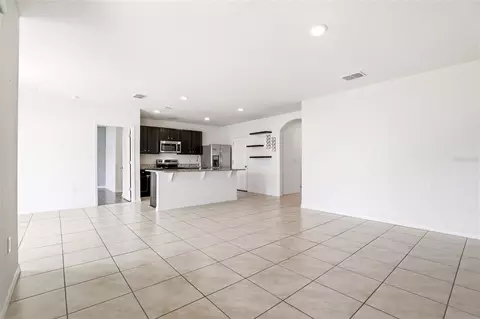 Living - 5636 Westerly Breeze Pl, Saint Cloud, FL 34771 photo 5 of 7