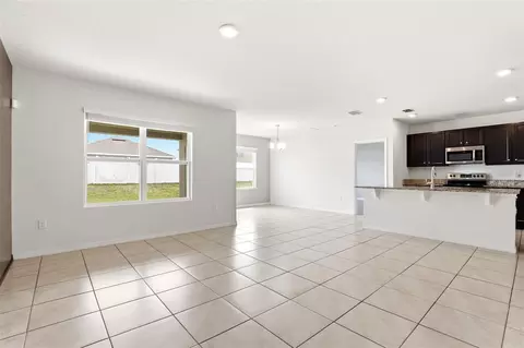 Living - 5636 Westerly Breeze Pl, Saint Cloud, FL 34771 photo 4 of 7
