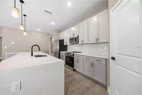Kitchen - 2108 River Hawk Loop, Winter Haven, FL 33880 photo 2 of 2