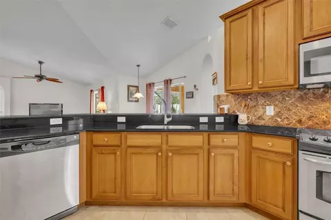 Kitchen - 887 Seneca Trl, Saint Cloud, FL 34772 photo 4 of 4