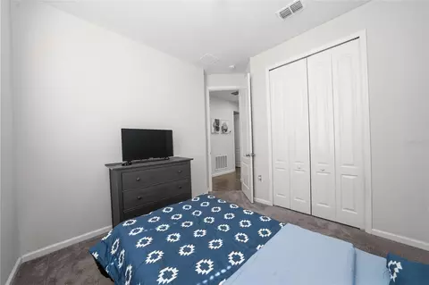 Bedroom - 5610 Western Sun Dr, Saint Cloud, FL 34771 photo 5 of 7