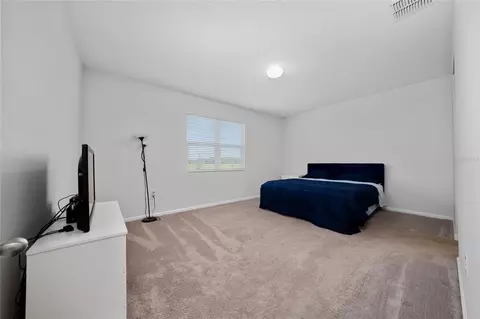 Bedroom - 5610 Western Sun Dr, Saint Cloud, FL 34771 photo 6 of 7
