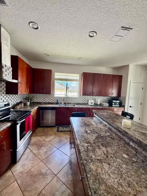 Kitchen - 3514 Pintail Ln, Saint Cloud, FL 34772 photo 2 of 5