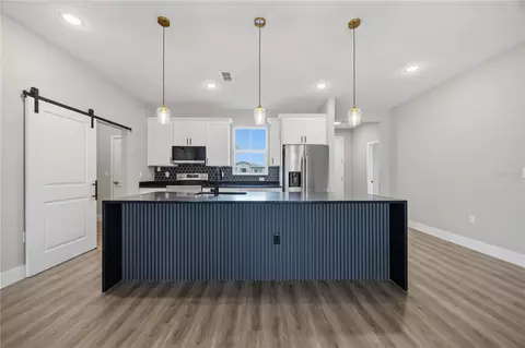 Kitchen - 2122 River Hawk Loop, Winter Haven, FL 33880 photo 2 of 6