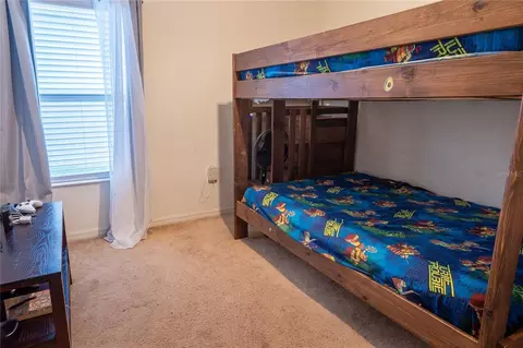 Bedroom - 4563 Orchard Grove Rd, Saint Cloud, FL 34772 photo 5 of 11