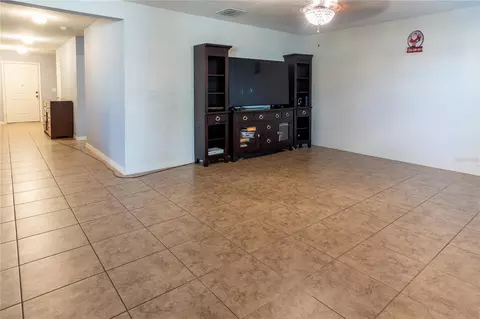 Living - 4563 Orchard Grove Rd, Saint Cloud, FL 34772 photo 1 of 2