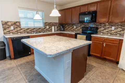 Kitchen - 4563 Orchard Grove Rd, Saint Cloud, FL 34772 photo 1 of 3