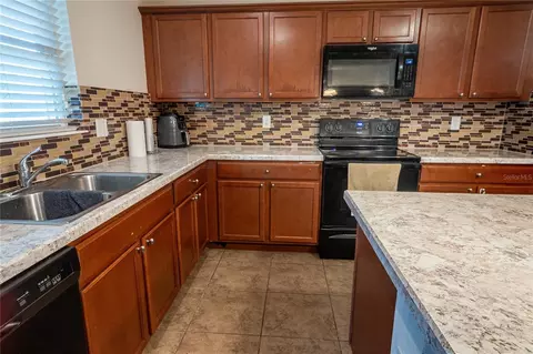 Kitchen - 4563 Orchard Grove Rd, Saint Cloud, FL 34772 photo 2 of 3