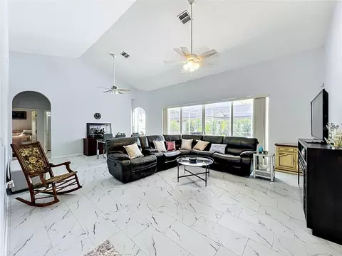 Living - 909 Grovesmere Loop, Ocoee, FL 34761 photo 1 of 4