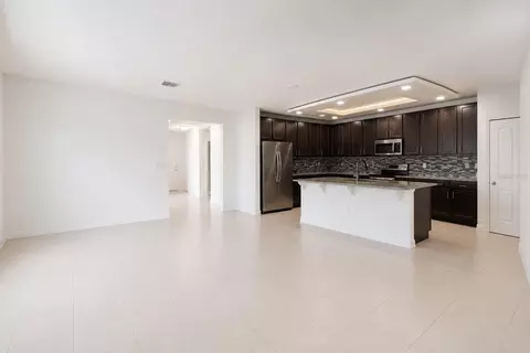 Living - 507 Pinecrest Loop, Davenport, FL 33837 photo 1 of 2
