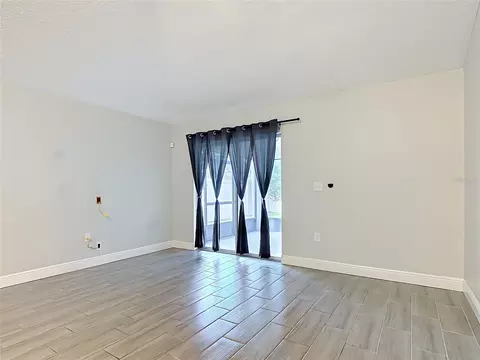 Living - 3040 Lakes Crest Ave, Saint Cloud, FL 34772 photo 4 of 6