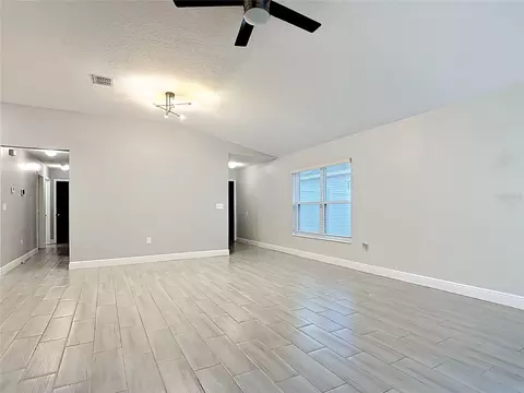 Living - 3040 Lakes Crest Ave, Saint Cloud, FL 34772 photo 2 of 6