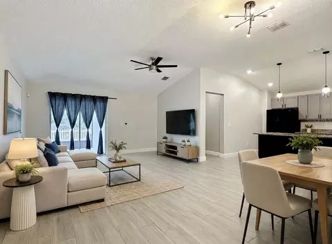 Living - 3040 Lakes Crest Ave, Saint Cloud, FL 34772 photo 2 of 4
