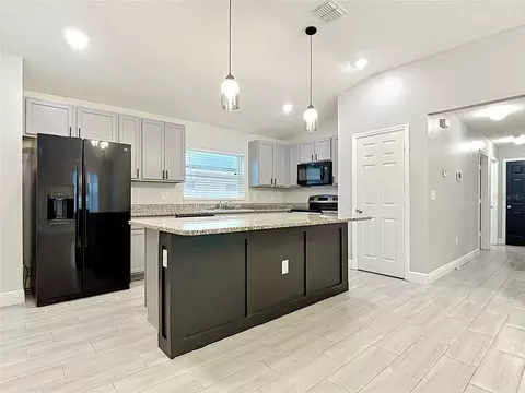 Kitchen - 3040 Lakes Crest Ave, Saint Cloud, FL 34772 photo 3 of 8