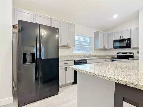 Kitchen - 3040 Lakes Crest Ave, Saint Cloud, FL 34772 photo 4 of 8