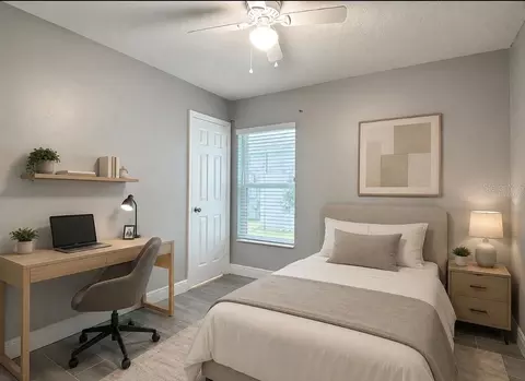 Bedroom - 3040 Lakes Crest Ave, Saint Cloud, FL 34772 photo 7 of 11
